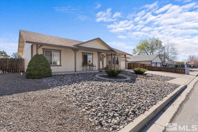2036 Flycatcher Ct, Sparks, NV 89441 - ranch-style house featuring fence, an attached garage, a porch, and concrete driveway