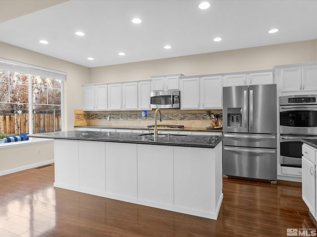 3240 Dunbar Ct, Sparks, NV 89436 - kitchen with appliances with stainless steel finishes, a sink, dark wood-style floors, tasteful backsplash, and recessed lighting