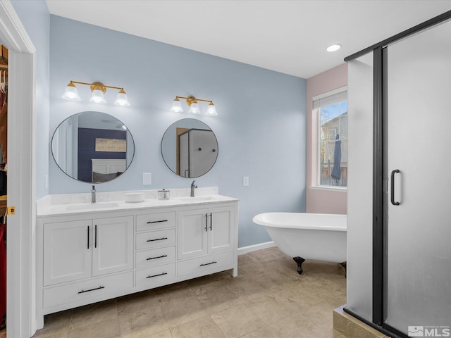 3240 Dunbar Ct, Sparks, NV 89436 - bathroom featuring double vanity, a freestanding bath, and baseboards