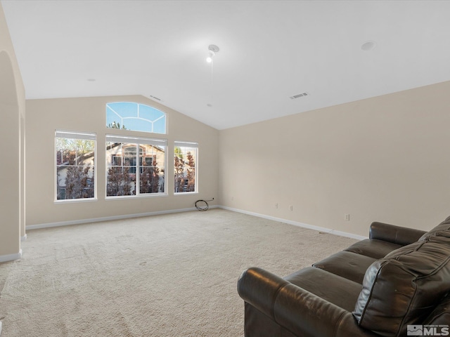 3240 Dunbar Ct, Sparks, NV 89436 - living room with lofted ceiling, light carpet, and baseboards