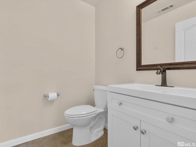 3240 Dunbar Ct, Sparks, NV 89436 - bathroom with baseboards, toilet, and vanity