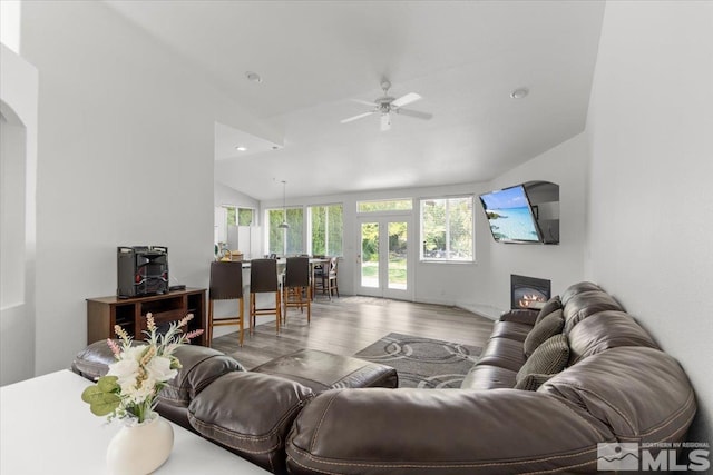 2525 Beaumont Pkwy, Reno, NV 89523 - living room with wood finished floors, a ceiling fan, vaulted ceiling, and french doors