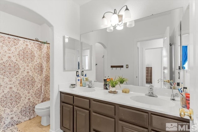 2525 Beaumont Pkwy, Reno, NV 89523 - bathroom featuring toilet, double vanity, tile patterned floors, a chandelier, and a shower with curtain
