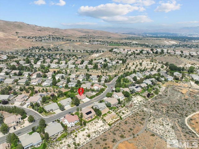 2525 Beaumont Pkwy, Reno, NV 89523 - aerial overview of property's location with mountains and nearby suburban area