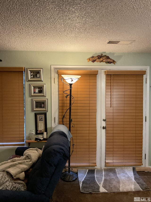 3645 Peregrine Cir, Reno, NV 89508 - entrance foyer featuring a textured ceiling