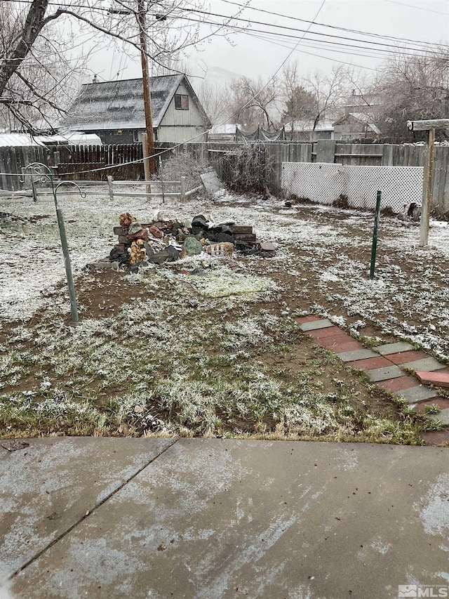 3645 Peregrine Cir, Reno, NV 89508 - yard layered in snow with fence