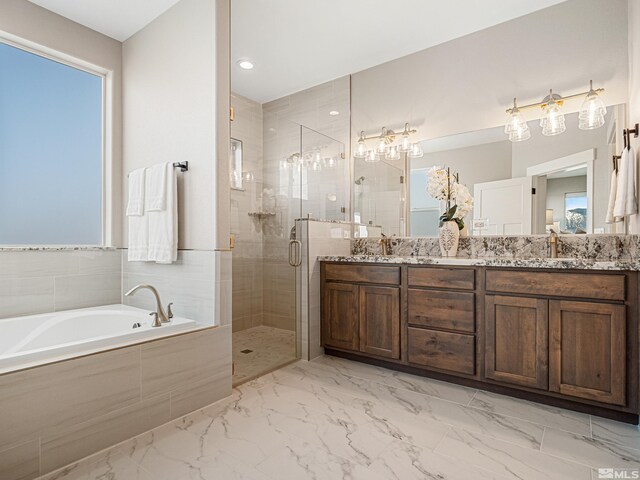 5376 S Edmonds Dr, Carson City, NV 89701 - bathroom with a bath, a shower stall, double vanity, and marble finish floors