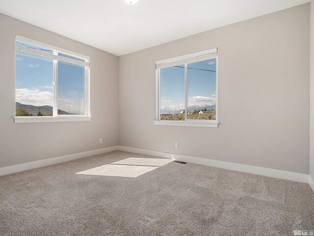 5376 S Edmonds Dr, Carson City, NV 89701 - spare room featuring carpet and baseboards