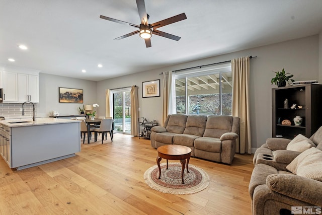 5989 Hidden Highlands Dr, Reno, NV 89502 - living room featuring light wood-type flooring, recessed lighting, and ceiling fan