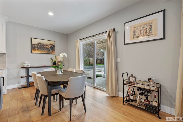 5989 Hidden Highlands Dr, Reno, NV 89502 - dining room featuring light wood-type flooring, baseboards, and recessed lighting
