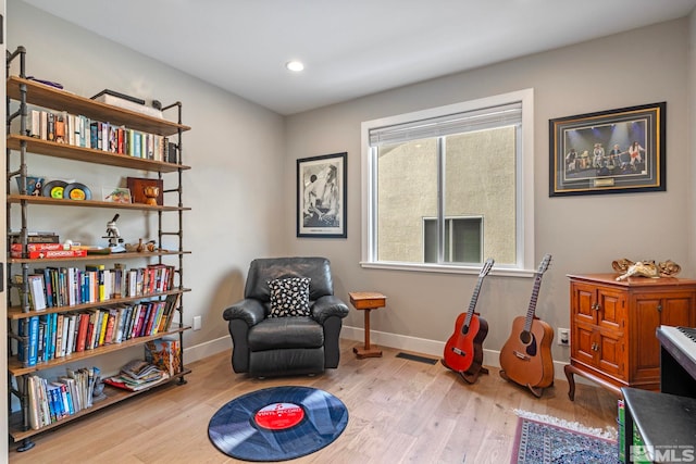 5989 Hidden Highlands Dr, Reno, NV 89502 - sitting room with baseboards, wood finished floors, and recessed lighting