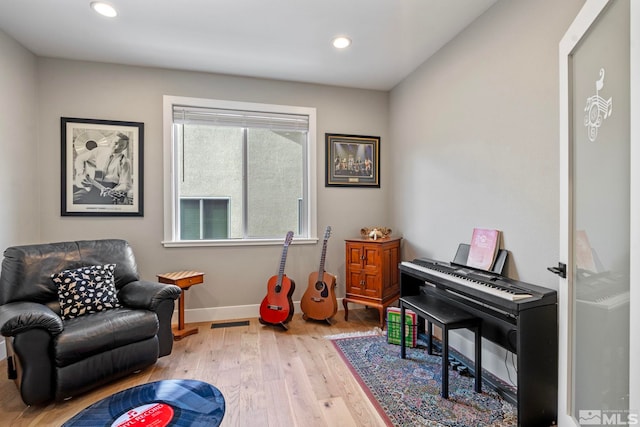 5989 Hidden Highlands Dr, Reno, NV 89502 - living area featuring wood finished floors, baseboards, and recessed lighting