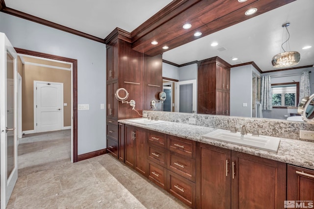 2501 Kensington Pl, Carson City, NV 89703 - full bathroom with crown molding, double vanity, baseboards, and recessed lighting