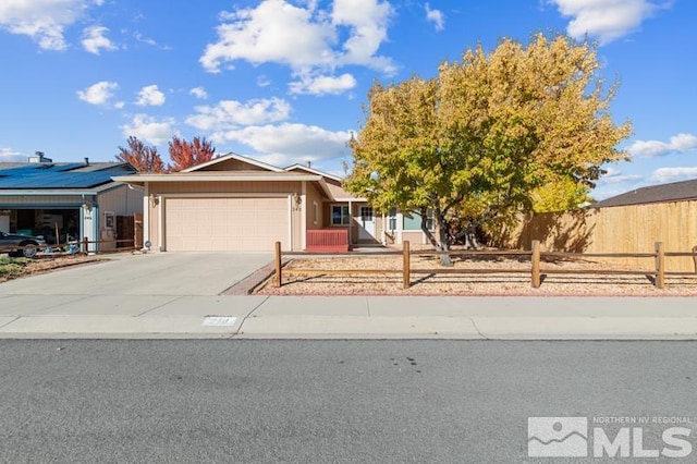 248 Woodlake Cir, Dayton, NV 89403 - single story home with an attached garage, fence, and driveway