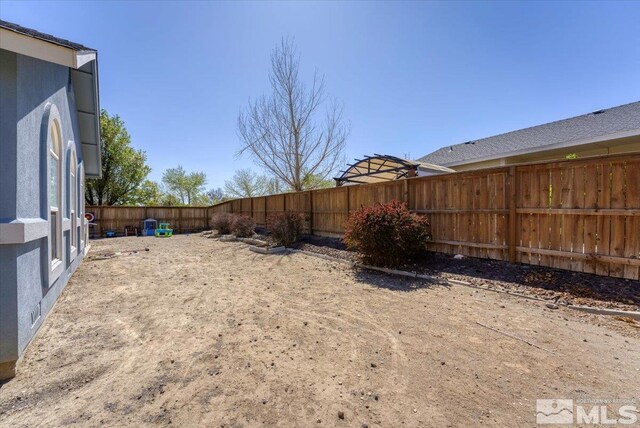 989 Julia Ln, Fernley, NV 89408 - view of fenced backyard