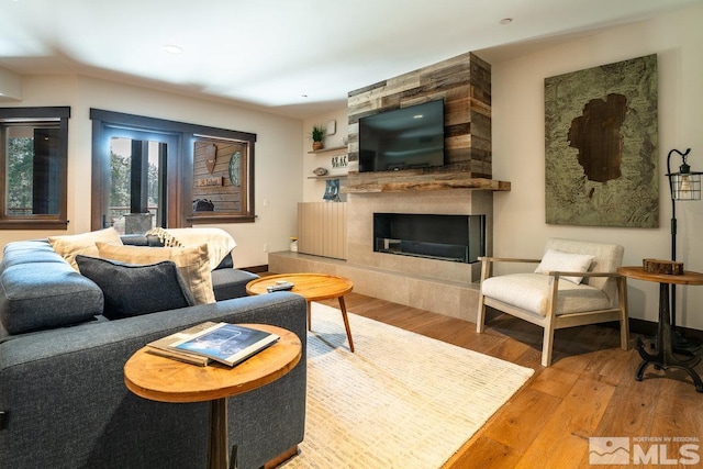 17 Beach Club Dr Unit 221, Stateline, NV 89449 - living area featuring wood finished floors and a premium fireplace