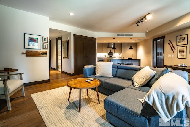 17 Beach Club Dr Unit 221, Stateline, NV 89449 - living area with dark wood finished floors, baseboards, recessed lighting, and track lighting