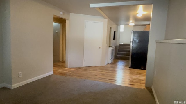 2602 William Ave, South Lake Tahoe, CA 96150 - unfurnished room with light colored carpet, baseboards, and light wood finished floors