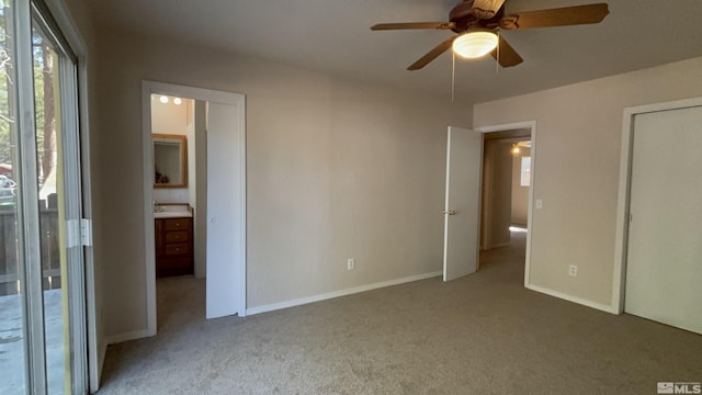 2602 William Ave, South Lake Tahoe, CA 96150 - unfurnished bedroom featuring carpet, ensuite bathroom, baseboards, and a ceiling fan