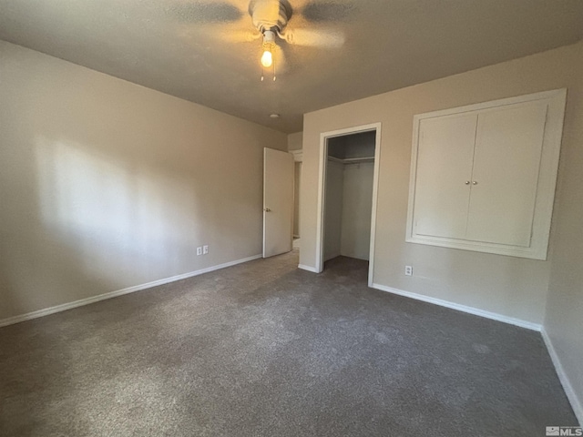 2602 William Ave, South Lake Tahoe, CA 96150 - unfurnished bedroom with dark colored carpet, baseboards, a ceiling fan, and a closet