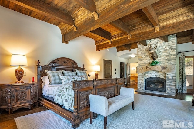 190 Yellow Jacket, Glenbrook, NV 89413 - bedroom with a wooden ceiling with exposed beams, wood finished floors, and a stone fireplace