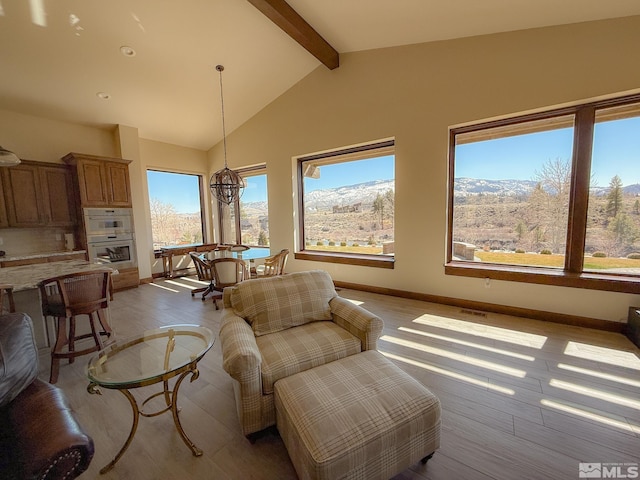 46 Silver Lynx Way, Verdi, NV 89439 - living room featuring light wood-style flooring, a chandelier, baseboards, and recessed lighting