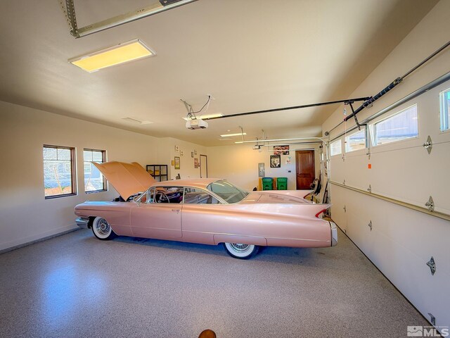 46 Silver Lynx Way, Verdi, NV 89439 - garage with a garage door opener and baseboards