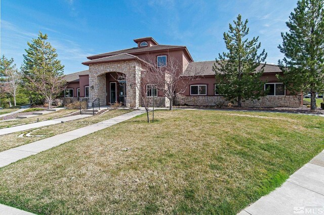 6850 Sharlands Ave Unit Y1149, Reno, NV 89523 - view of front of property featuring stone siding, stucco siding, and a front yard