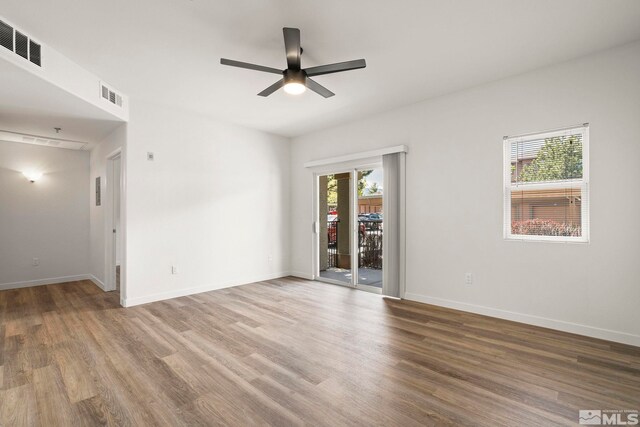 6850 Sharlands Ave Unit Y1149, Reno, NV 89523 - unfurnished room with a ceiling fan, wood finished floors, and baseboards