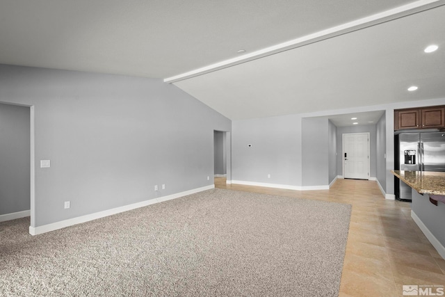 7760 Sonic Ct, Sparks, NV 89436 - unfurnished living room with recessed lighting, baseboards, and vaulted ceiling