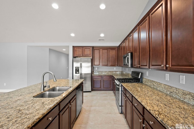 7760 Sonic Ct, Sparks, NV 89436 - kitchen with stainless steel appliances, a sink, light stone countertops, and recessed lighting