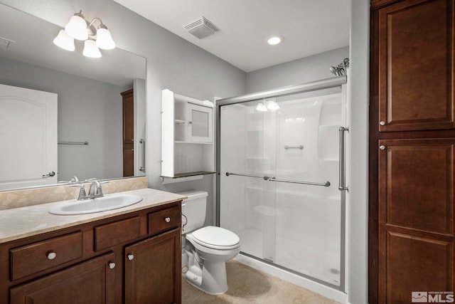7760 Sonic Ct, Sparks, NV 89436 - bathroom featuring toilet, a shower stall, vanity, and tile patterned floors