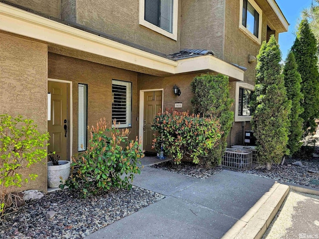900 S Meadows Pkwy Unit 5414, Reno, NV 89521 - property entrance with stucco siding and central AC unit