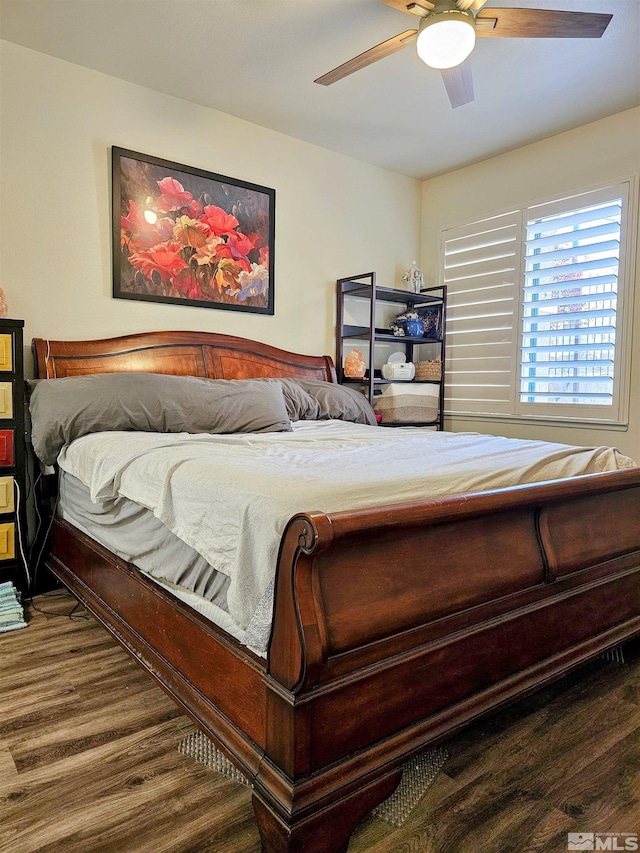 900 S Meadows Pkwy Unit 5414, Reno, NV 89521 - bedroom with wood finished floors and ceiling fan
