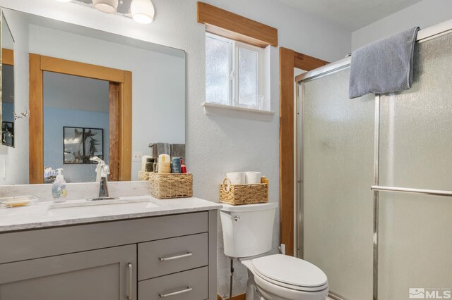 119 River Village Cir, Dayton, NV 89403 - full bathroom featuring a shower stall, toilet, and vanity