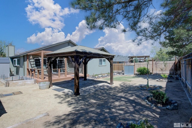 119 River Village Cir, Dayton, NV 89403 - view of patio with a gazebo and a fenced backyard