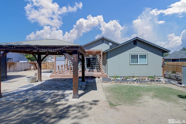 119 River Village Cir, Dayton, NV 89403 - single story home with a fenced backyard, a gazebo, a patio area, and a deck