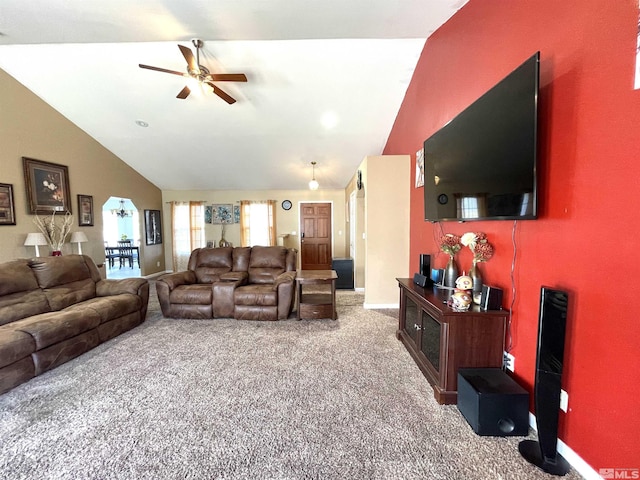living area featuring carpet, ceiling fan, and high vaulted ceiling
