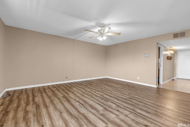 3089 Cashill Blvd, Reno, NV 89509 - empty room with ceiling fan, light wood-style floors, and baseboards