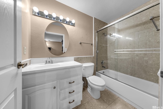 3089 Cashill Blvd, Reno, NV 89509 - full bath featuring tile patterned flooring, vanity, enclosed tub / shower combo, and toilet