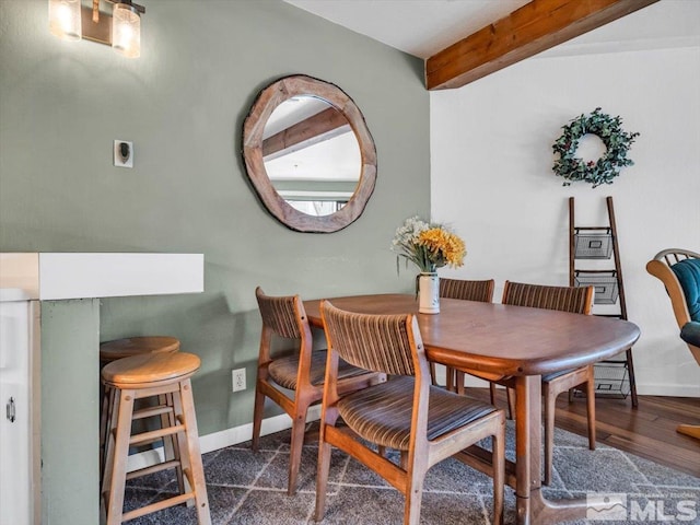 555 Tahoe Keys Blvd Unit 14, South Lake Tahoe, CA 96150 - dining area featuring baseboards and beam ceiling