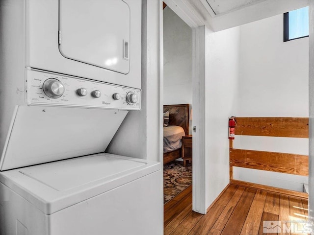555 Tahoe Keys Blvd Unit 14, South Lake Tahoe, CA 96150 - laundry room featuring hardwood / wood-style floors, estacked washer and dryer, and attic access