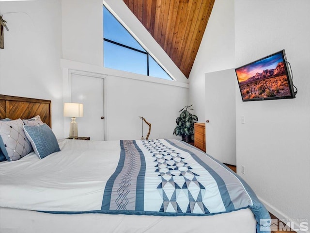 555 Tahoe Keys Blvd Unit 14, South Lake Tahoe, CA 96150 - bedroom featuring high vaulted ceiling, wooden ceiling, and baseboards
