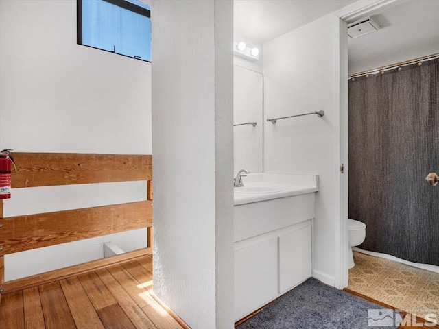 555 Tahoe Keys Blvd Unit 14, South Lake Tahoe, CA 96150 - bathroom with toilet, vanity, and wood finished floors