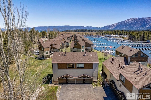 555 Tahoe Keys Blvd Unit 14, South Lake Tahoe, CA 96150 - bird's eye view of a mountain backdrop and numerous boat docks