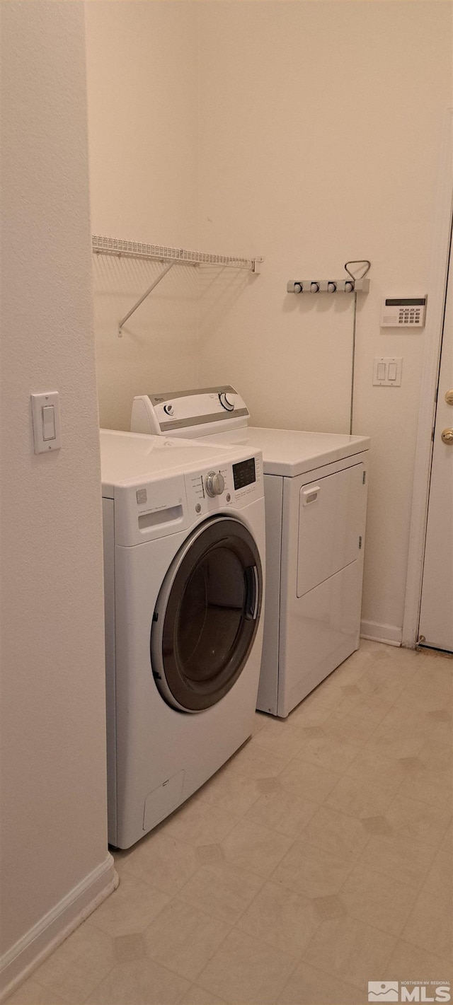 1360 Veneto Dr, Sparks, NV 89434 - laundry area with independent washer and dryer and baseboards