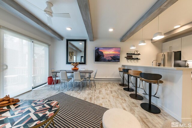 989 Tahoe Blvd Unit 36, Incline Village, NV 89451 - bar area with freestanding refrigerator, wood finished floors, beamed ceiling, baseboards, and ceiling fan