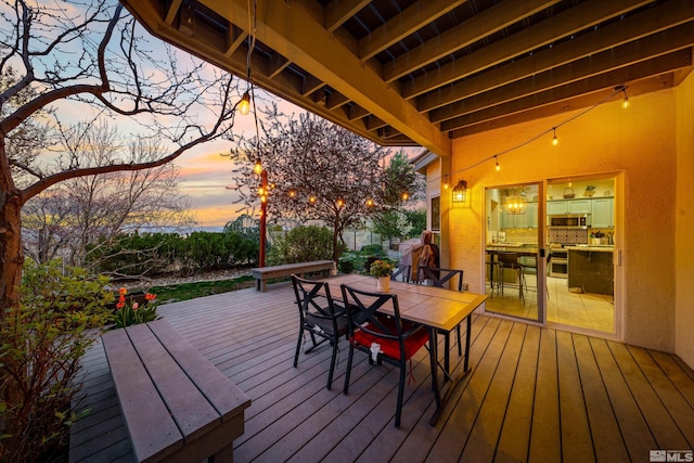 2900 Ariel Dr, Reno, NV 89523 - deck at dusk with outdoor dining space