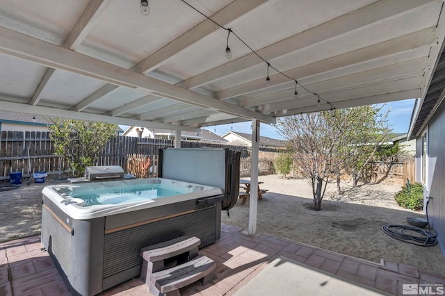 233 Jennys Ln, Fernley, NV 89408 - view of patio with a hot tub and a fenced backyard
