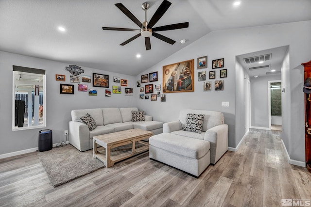 233 Jennys Ln, Fernley, NV 89408 - living room featuring light wood-style flooring, a ceiling fan, vaulted ceiling, baseboards, and recessed lighting